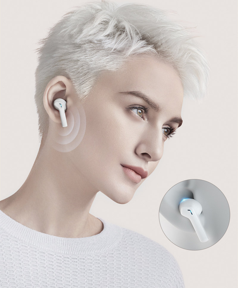 white wireless earbuds