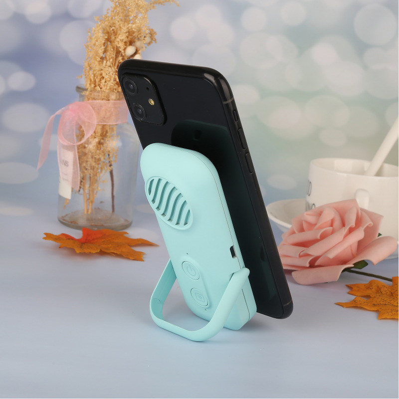 Mobile phone holder speaker