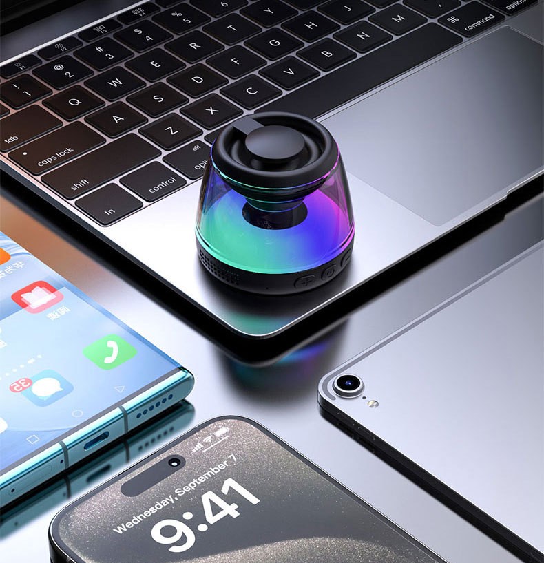 Magnetic speaker with mobile phone holder